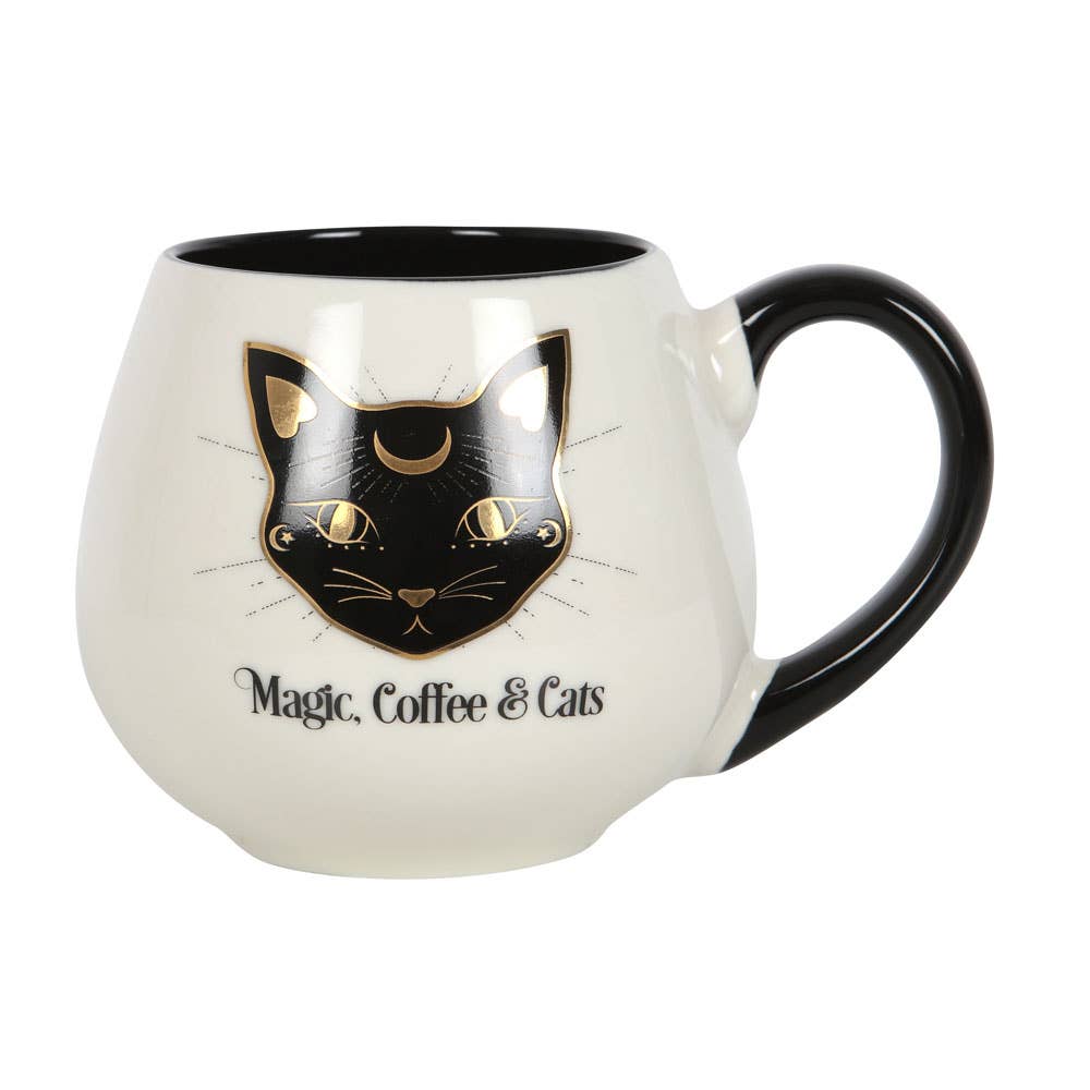 Tasse ronde avec motif magique, café et chats